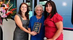 Montebello Bus Lines Assistant Director of Transporation Alva Carrasco (L) and Director of Transportation Aurora Jackson (R),congratulate Helen Cota for being the bus lines longest riding passenger. Cota has be riding the bus lines regularly for 52 years. The East Los Angeles resident rides the bus to her job at the Montebello Senior Center and to run errands. She was recognized at Montebello Bus Lines 80th Anniversary celebration.