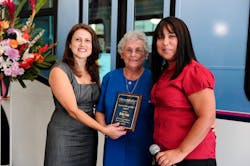 Montebello Bus Lines Assistant Director of Transporation Alva Carrasco (L) and Director of Transportation Aurora Jackson (R),congratulate Helen Cota for being the bus lines longest riding passenger. Cota has be riding the bus lines regularly for 52 years. The East Los Angeles resident rides the bus to her job at the Montebello Senior Center and to run errands. She was recognized at Montebello Bus Lines 80th Anniversary celebration. Montebello Bus Lines Assistant Director of Transporation Alva Carrasco (L) and Director of Transportation Aurora Jackson (R),congratulate Helen Cota for being the bus lines longest riding passenger. Cota has be riding the bus lines regularly for 52 years. The East Los Angeles resident rides the bus to her job at the Montebello Senior Center and to run errands. She was recognized at Montebello Bus Lines 80th Anniversary celebration.