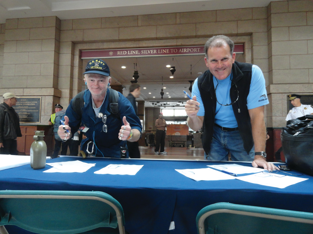MBCR conductor Dan Murphy (right) stops to write a letter.