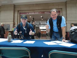 MBCR conductor Dan Murphy (right) stops to write a letter. MBCR conductor Dan Murphy (right) stops to write a letter.