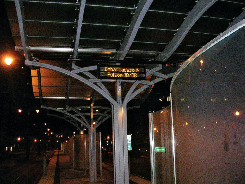 NextBus passenger transit alert on San Francisco Mincipal Transportation Agency LRV platform.