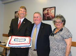 From left, President Dick Ruddell, The T Board Chair Gary Cumbie and Rosa Navejar, The T Board Vice President