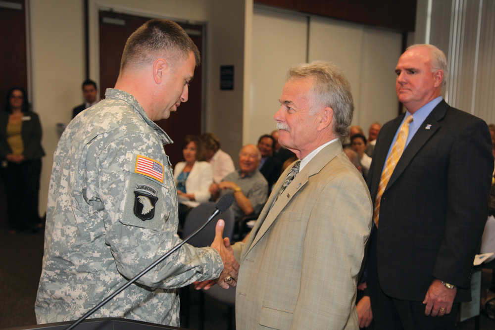 From left, Lieutenant Colonel Thomas Hansbarger, OCTA CEO Will Kempton and OCTA Executive Director of Human Resources and Organizational Development Paddy Gough.