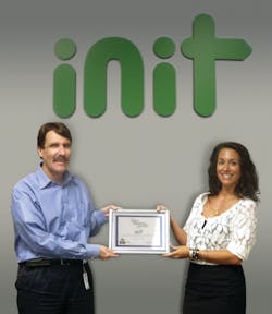 INIT CEO, Roland Staib accepted the Zero Waste to Landfill Certification presented by Deborah Albero-Darata of TFC Recycling. INIT CEO, Roland Staib accepted the Zero Waste to Landfill Certification presented by Deborah Albero-Darata of TFC Recycling.