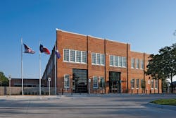 View of north façade after rehabilitation, including new windows, parapet cap, repaired masonry and landscaping. View of north façade after rehabilitation, including new windows, parapet cap, repaired masonry and landscaping.
