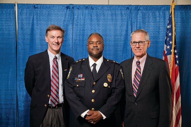 Former St. Paul Police Chief John Harrington was sworn in on September 4, 2012 as the seventh Chief of Metro Transit Police. Met Council Regional Administrator Pat Born is pictured right and Metro Transit General Manager Brian Lamb is pictured at left.