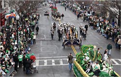 Thousands of spectators crowd the streets of the Boston St. Patrick's Day Parade in South Boston, Thousands of spectators crowd the streets of the Boston St. Patrick's Day Parade in South Boston,