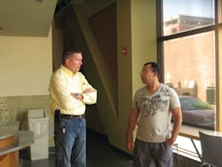 TCAT’s Dan Tome, left, at Green Street Station with Adil Griguihi who plans to open a café at the bus hub on Sept. 23. TCAT’s Dan Tome, left, at Green Street Station with Adil Griguihi who plans to open a café at the bus hub on Sept. 23.