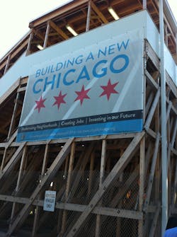 A 'Building a new Chicago' banner hangs from a temporary staircase at the Garfield Green Line station in Chicago. A 'Building a new Chicago' banner hangs from a temporary staircase at the Garfield Green Line station in Chicago.
