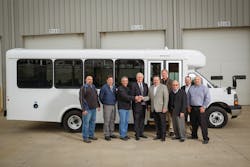 From left to right, Wayne South, Ed Gajecki and Jim Walton, of city of Calgary, Wes Woods, of Crestline Coach, Don Roberts, Robb Ledbetter, Del Herr, Ben Cupp, Chris Ward, of Arboc.