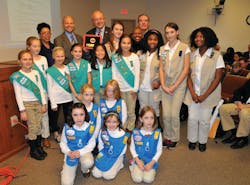The Girl Scouts of Middle Tennessee presented city of Franklin leaders with a framed transportation patch.
