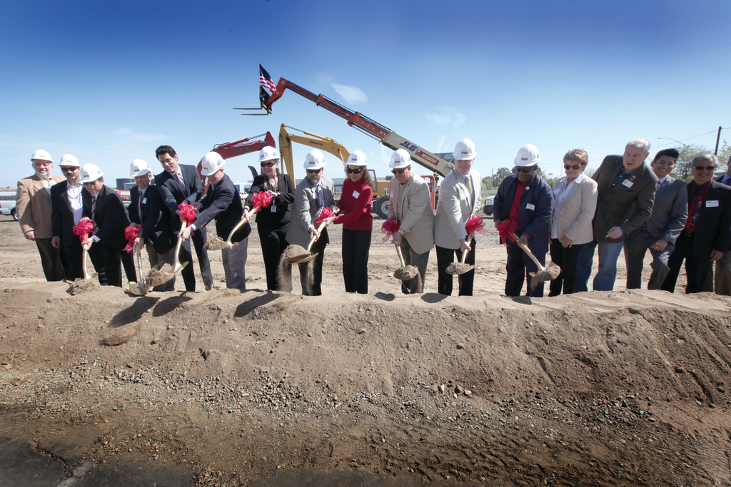 Officials take part in the groundbreaking of the San Joaquin RTD transit center.