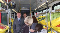 Valley Metro Chair and Mesa Councilmember, Scott Somers (left), with “passengers” aboard the Fresh Express bus. Valley Metro Chair and Mesa Councilmember, Scott Somers (left), with “passengers” aboard the Fresh Express bus.