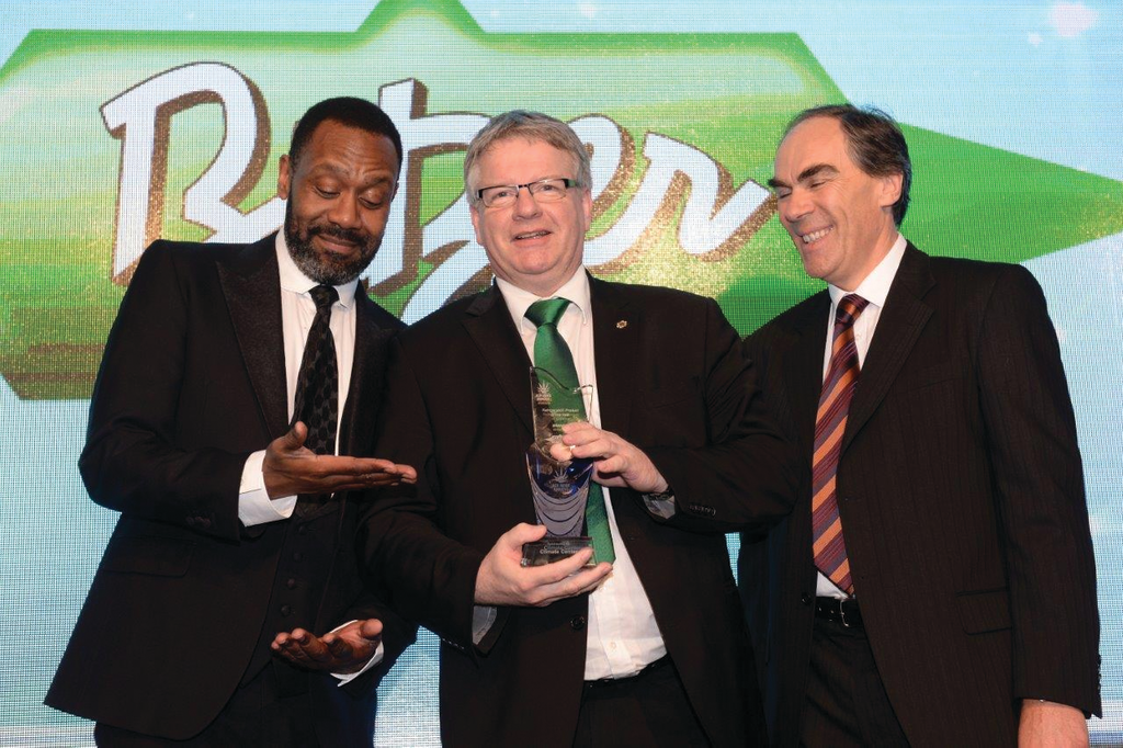 Entertainer Lennie Henry, left, and Climate Center&rsquo;s National Sales Manager for Cooling, George Derbyshire, right, presented Kevin Glass, managing director of Bitzer U.K., with the 2014 Refrigeration Product of the Year Award. Climate Center sponsored this year&rsquo;s award ceremony.