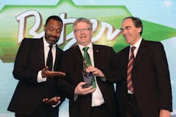 Entertainer Lennie Henry, left, and Climate Center&rsquo;s National Sales Manager for Cooling, George Derbyshire, right, presented Kevin Glass, managing director of Bitzer U.K., with the 2014 Refrigeration Product of the Year Award. Climate Center sponsored this year&rsquo;s award ceremony.