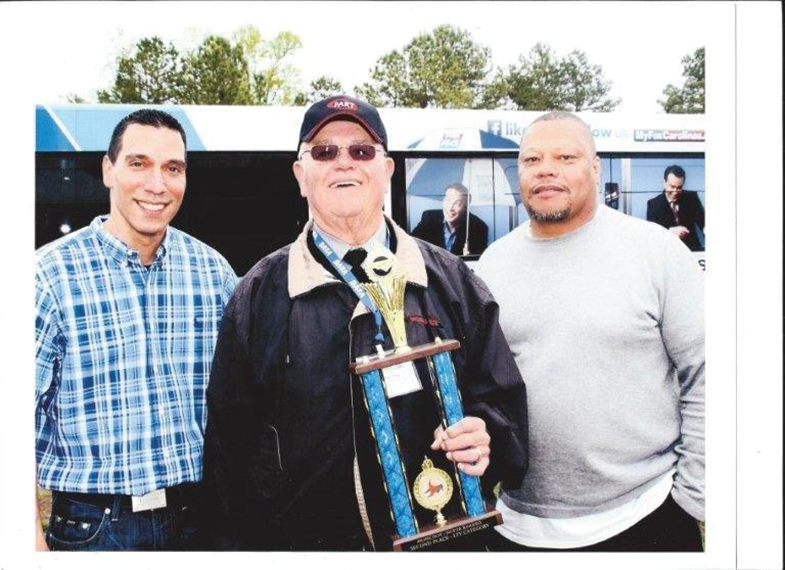 From left to right, Joe Sanchez, National Express general manager at PART; J.W. Gilley, National Express operator at PART; Marshall Lawrence, HUB supervisor