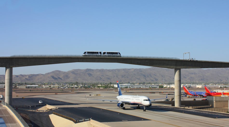 : The guideway crosses over Taxiway Romeo. The 340-foot bridge was designed with a vertical clearance height of more than 75 feet.
