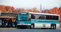 One of PRTC’s MCI buses picks up passengers bound for the Pentagon. One of PRTC’s MCI buses picks up passengers bound for the Pentagon.