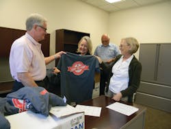 CART (Cleveland Area Rapid Transit) employees, left to right, Roy Bendure, Cherry Strong, Dick Messner and Karleene Smith sort Dump the Pump T-shirts by size before handing them out to bus riders on Dump the Pump Day. The annual event celebrating public transportation and CART will be Thursday, June 19. Fare will be free on all routes except the commuter route to Oklahoma City. T-shirts will be handed out to riders at CART&rsquo;s Brooks Street Transfer Station from 8 a.m. to 4 p.m. or while supplies last.
