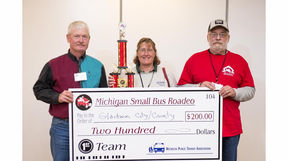 Gladwin City/County Transit won first place in the team competition at the Michigan Small Bus Roadeo, with drivers Harold Smith, Jon Greer and Deanna Hughes.