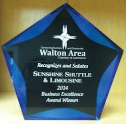 The Walton Area Chamber of Commerce presented Sunshine Shuttle &amp; Limousine their annual Business Excellence Award.