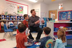 RNL Design Eastern Region Transit Director/Associate Principal Ken Anderson talks to his son’s preschool class about public transportation and leads them in making their own bus. RNL Design Eastern Region Transit Director/Associate Principal Ken Anderson talks to his son’s preschool class about public transportation and leads them in making their own bus.