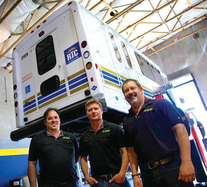 RO Bus Sales co-owner Brian Edwards (left), general manager Bobby Bracken and owner Joe Machin with one of the last of 80 paratransit buses the Las Vegas company up-fitted with advanced energy-saving CNG (natural gas) tanks and other safety features for the Regional Transportation Commission of Southern Nevada (RTC). The project added six jobs at RO and ensured steady work for four subcontractors in a successful public-private partnership.