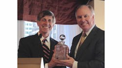 Paul Zofnass, founder and President of EFCG (Left) presenting the &ldquo;EFCG 2014 CEO of the Year&rdquo; award to George J. Pierson, President and Chief Executive Officer of Parsons Brinckerhoff.