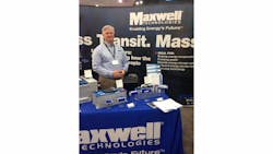 Chuck Cook, sales application engineer, Maxwell Technologies, in front of several of their ultracapacitor technologies on display at APTA 2014. Chuck Cook, sales application engineer, Maxwell Technologies, in front of several of their ultracapacitor technologies on display at APTA 2014.
