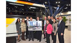 Patrick Scully, MCI executive vice president (third from left), meets with Houston Metro executives and staff in MCI&rsquo;s booth at APTA Expo.