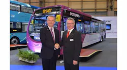 Nigel Eggleton, left, managing director of First Midlands, at the official handover of the new Wrightbus StreetLite Max featuring a Daimler Euro 6 engine with Ian Downie, sales and customcare managing director for Wrightbus.