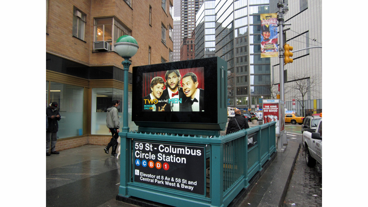 Typical outdoor digital LCD display at a subway entrance.