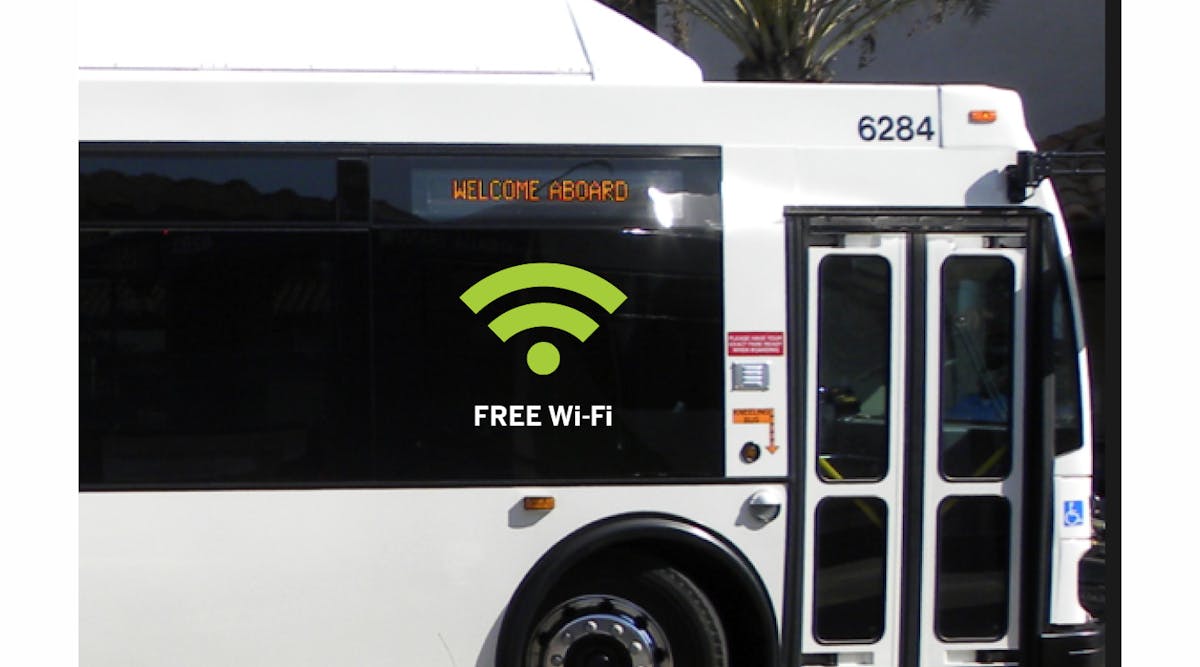 A large sticker on the side of a Visalia Transit bus advertises the free Wi-Fi service on board.