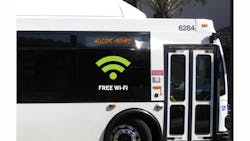 A large sticker on the side of a Visalia Transit bus advertises the free Wi-Fi service on board. A large sticker on the side of a Visalia Transit bus advertises the free Wi-Fi service on board.