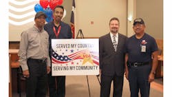 From left to right, Melvin Banks, vehicle service foreman; Ruben Noriega, acting paratransit operations administrator; Jeffrey Arndt, president/CEO; Edmund Herrera, steam cleaner operator.