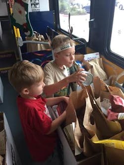 Capital Metro filled two buses with donations during the Stuff the Bus drive.