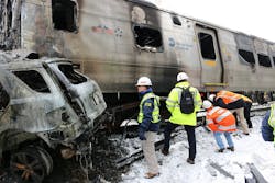 Member Sumwalt surveys vehicles involved in the Metro North train crash. Member Sumwalt surveys vehicles involved in the Metro North train crash.