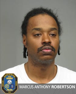 Metro Transit Police have arrested Marcus Anthony Robertson, 43, of Washington, D.C., on charges of felony hoax in connection with two suspicious packages that were left at Metrorail stations Feb. 23.