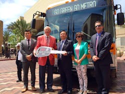 Wang Chuanfu hands the first set of keys for Los Angeles&rsquo;s first electric buses to LA County Supervisor and Metro board member Michael Antonovich.