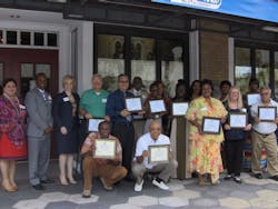 Back row, from left to right, Ruthie Reyes Burckard, HART chief operating officer; Michael Stephens, chief business enterprise and safety officer; Katharine Eagan, chief executive officer; Timothy Mathias, Luis Claro, Claude Matthews, Jacqueline Franklin, Sheryl West, Jacqueline Walden, Geraldine James, Gloria Ellison, Tawanda Williams, Gloria Girard, Valencia Joyce, and Ermin Morales. Front row, from left to right, Thomas Mouling, Roland 'Skip' Diggs. Back row, from left to right, Ruthie Reyes Burckard, HART chief operating officer; Michael Stephens, chief business enterprise and safety officer; Katharine Eagan, chief executive officer; Timothy Mathias, Luis Claro, Claude Matthews, Jacqueline Franklin, Sheryl West, Jacqueline Walden, Geraldine James, Gloria Ellison, Tawanda Williams, Gloria Girard, Valencia Joyce, and Ermin Morales. Front row, from left to right, Thomas Mouling, Roland 'Skip' Diggs.