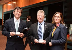 Victorian Minister for Roads and Road Safety Luke Donnellan, left, was welcomed to the Summit by ITS Australia President Briand Negus and Chief Executive Officer Susan Harris. Victorian Minister for Roads and Road Safety Luke Donnellan, left, was welcomed to the Summit by ITS Australia President Briand Negus and Chief Executive Officer Susan Harris.