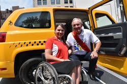 Mobility Ventures, spokesperson Kristina Rhodes, and Former Senator Tom Harkin, architect of the American&apos;s with Disability Act (ADA), pose in the entrance of a new MV-1 vehicle. The new 2016 MV-1 was unveiled at the New York City Disability Pride Parade where Mobility Ventures was the lead sponsor.