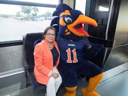 Hope Andrade, Chairwoman of the Via Board of Trustees, visits with Rowdy from the University of Texas at San Antonio before helping students learn how to use the Semester Pass. Hope Andrade, Chairwoman of the Via Board of Trustees, visits with Rowdy from the University of Texas at San Antonio before helping students learn how to use the Semester Pass.