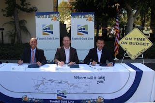 From left to right, Kevin Haboian, senior vice president, Parsons Transportation Group; Matt Scott, vice president and district manager, Kiewit Infrastructure West Co.; and Habib F. Balian, CEO of the Foothill Gold Line Construction Authority, sign the Substantial Completion Certificate for the Foothill Gold Line from Pasadena to Azusa.