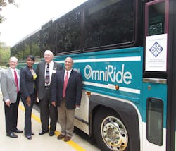 Celebrating the purchase of a PRTC OmniRide bus using NVTA funds are PRTC Interim Executive Director Eric Marx, NVTA Executive Director Monica Blackmon, Chairman of the PRTC Board of Commissioners John Jenkins, and NVTA Chairman Martin Nohe.