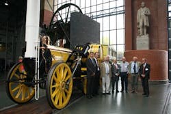 Early Hit Rail participants pose with early railway icon Stephenson&rsquo;s Rocket in the National Railway Museum.