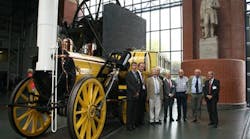 Early Hit Rail participants pose with early railway icon Stephenson&rsquo;s Rocket in the National Railway Museum.