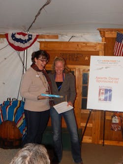 Amber Blake accepting her award. Amber Blake accepting her award.