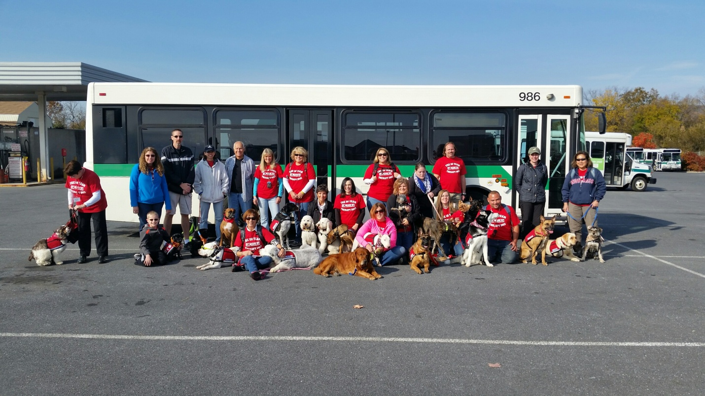 Go Team dogs visit TransIT Services of Frederick County, Maryland.