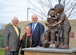 MTA board chairperson, Paul Newman, VSA Special Projects Coordinator, Randee Pieper (female in the middle) and Ed Benning, Flint MTA General Manager/CEO. MTA board chairperson, Paul Newman, VSA Special Projects Coordinator, Randee Pieper (female in the middle) and Ed Benning, Flint MTA General Manager/CEO.